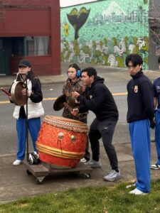 Vovinam Burien youth play percussion instruments at Renton Lunar New Year Lion Dance 2026