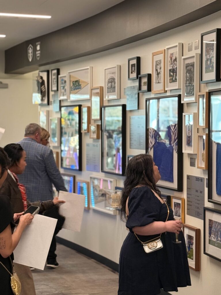 "A Night Around the World" guests viewing the Sounders FC gallery