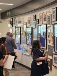 A passageway filled with photos and memorabilia from the Seattle Sounders FC.