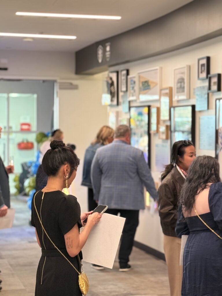 "A Night Around the World" guests look at Seattle Sounders FC gallery